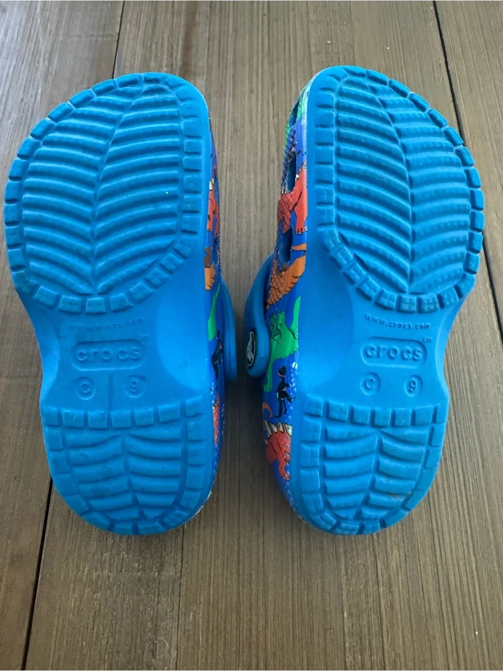 CROCS Kids' Bright Blue Dinosaur Print Clogs